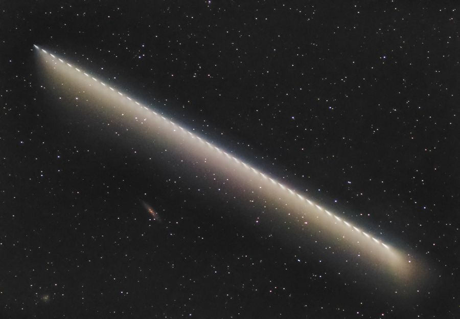 The image shows the Ariane V carrying JWST passing by the Sculptor Galaxy as seen from India. The image is a stack of 40 images taken in an interval of 1 second.