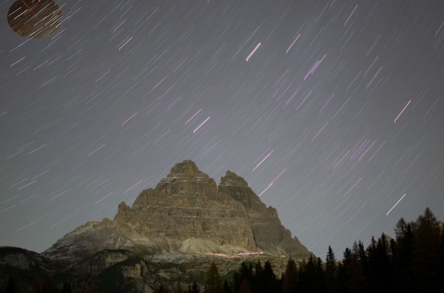 Rotazione terrestre e stella cadente sopra le Tre Cime