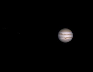 Il pianeta Giove con Ganimede e Io